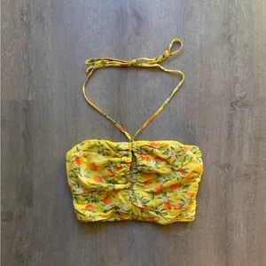 Super cute crop top halter top. Again i bought it without trying on: too small